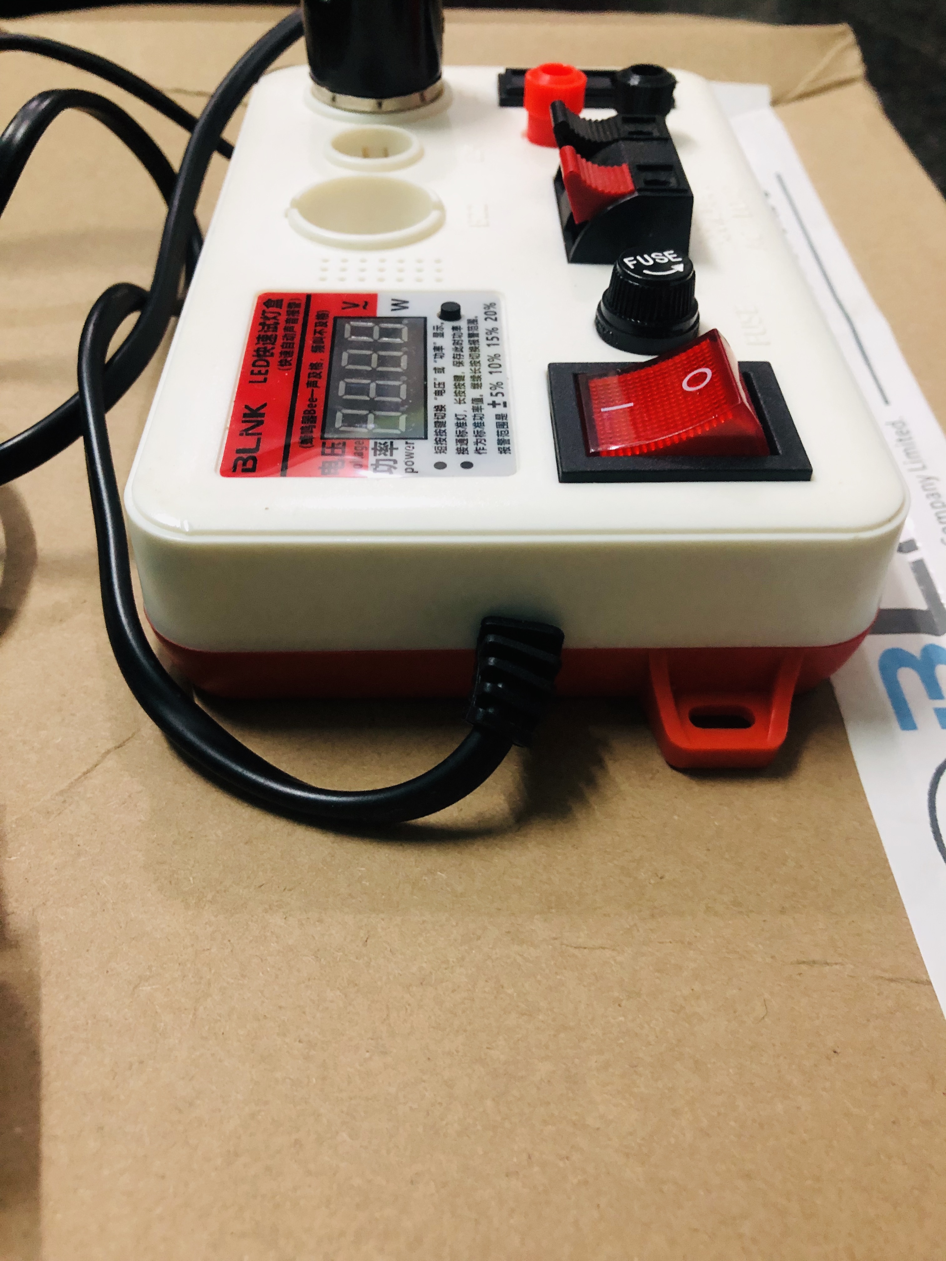 White And Red Display Watt Meter