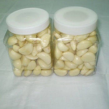 Peeled Garlic - 1 Kilogram, White Color, Raw Processing, A1 Grade, Rich Taste , Fresh Cloves With Long Shelf Life, Easy Storage Options
