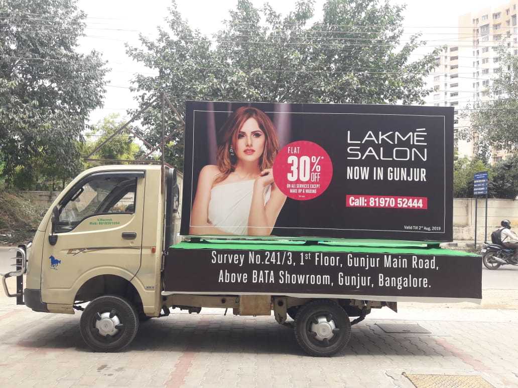 Mobile Vans Advertisement Services - Durable Vinyl Wraps | Eye-catching Designs, Customizable Options, Full-coverage Advertising