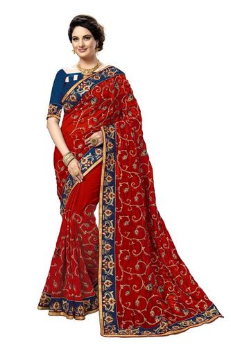 लाल और नीली कलामकारी डिज़ाइन की कशीदाकारी साटन साड़ी