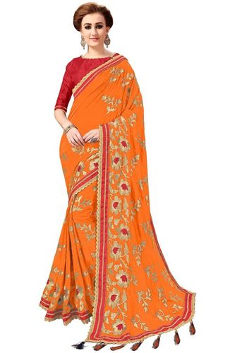 टैसल साड़ी के साथ पीले रंग की कढ़ाई वाला बुट्टा वर्क