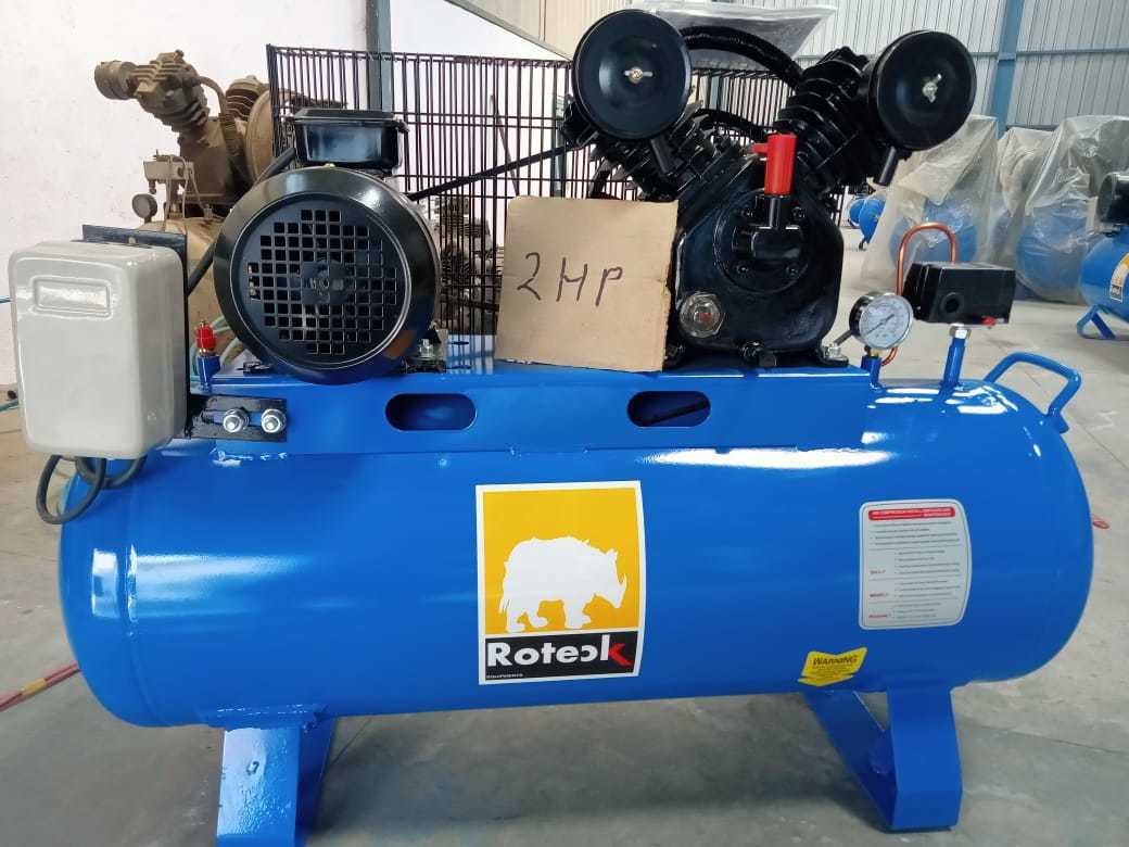 Reciprocating Air Compressor - Metal Construction, 220 Voltage | New Condition, High Performance