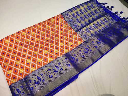 ऑर्गेंज़ा पाटन पटोला साड़ी ऑरेंज (नारंगी) नीले रंग के साथ