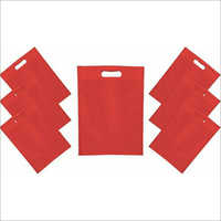 सादा डी कट गैर बुना कैरी बैग