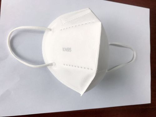 KN95 Face Mask - Non Woven Material, White Color, Lightweight at 5g | Enhanced Protection from Corona Virus in Sterilized Environment