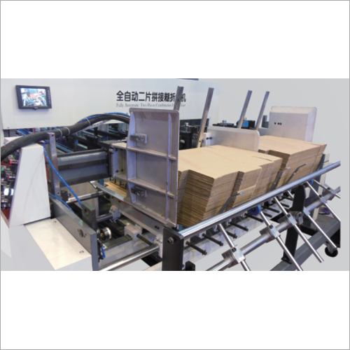 Double Feeder In Folder Gluer. Dimension(L*W*H): 16 Meter.  Meter (M)