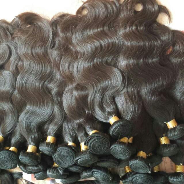 100% Un Processed Indian Human Hair - Color: Natural Brown