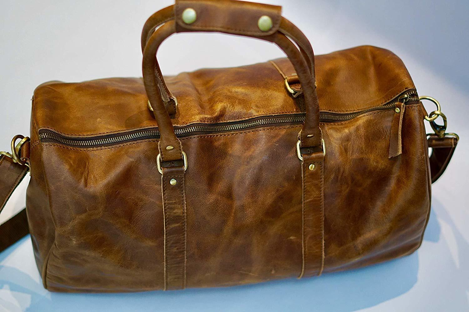 Prastara Genuine Leather Weekender Duffel Bag For Travel For Men And Women 24 * 10 * 10 Inch Brown Travel Duffel Design: 1 Closure Compartment