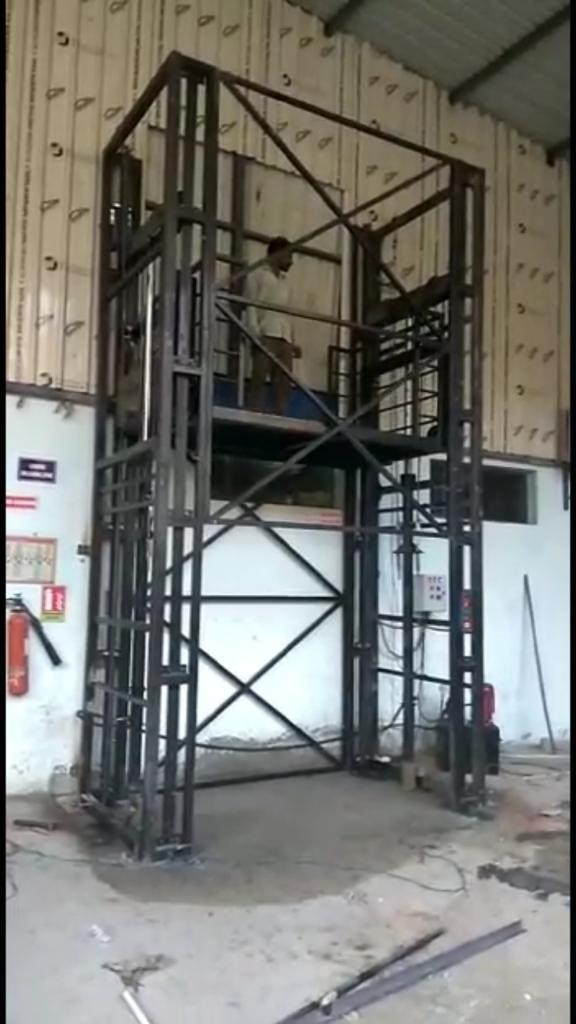 Goods Lifts - Mild Steel Body, Electric Power Source, Red Color | High Lifting Capacity, Designed For Industrial Use, 1-year Warranty