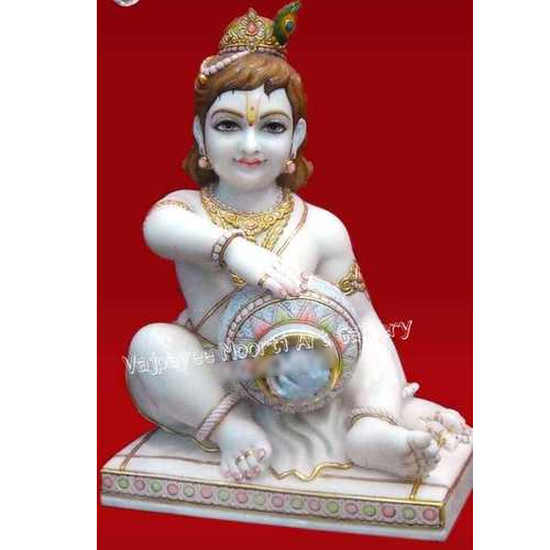 चमकाने वाली संगमरमर की माखनचोर प्रतिमा