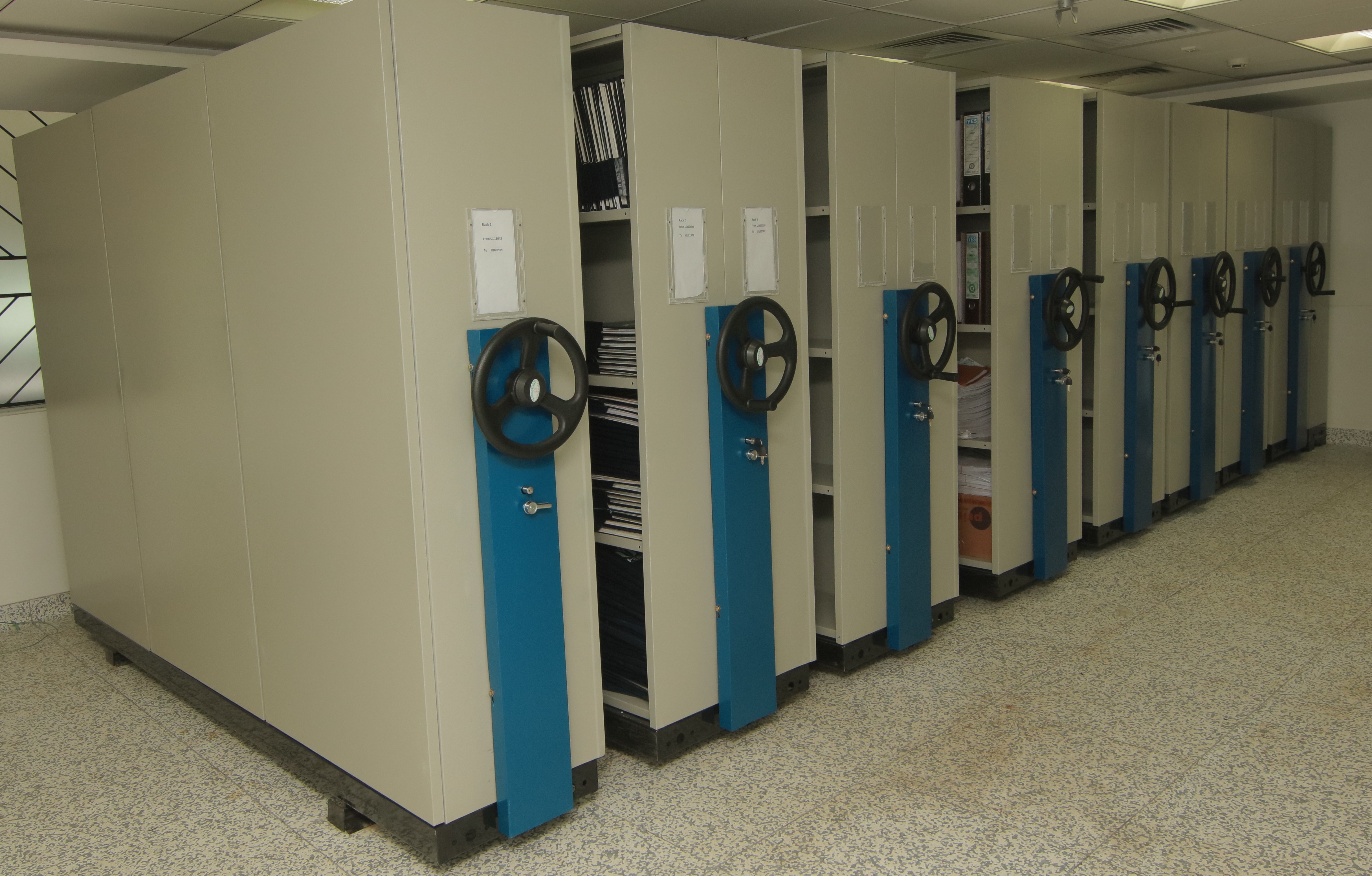 Mobile Rack Compactor - Steel, Customizable Dimensions, Blue | High Load Capacity, Powder Coated Finish, Adjustable Shelves, Secure Central Locking