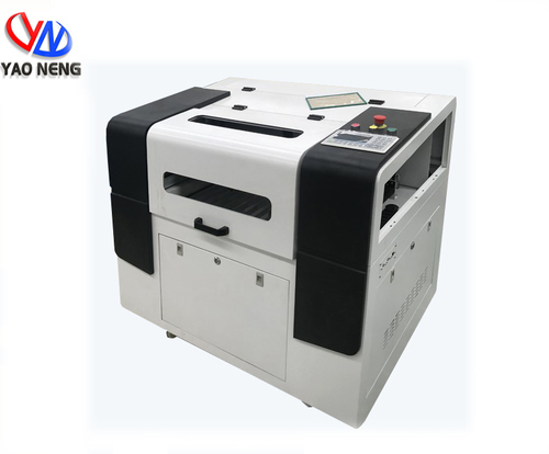 स्वचालित 6090 Co2 लेजर कटिंग एनग्रेविंग मशीन