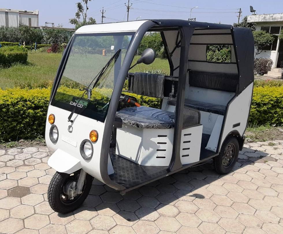 White Electric Rickshaw