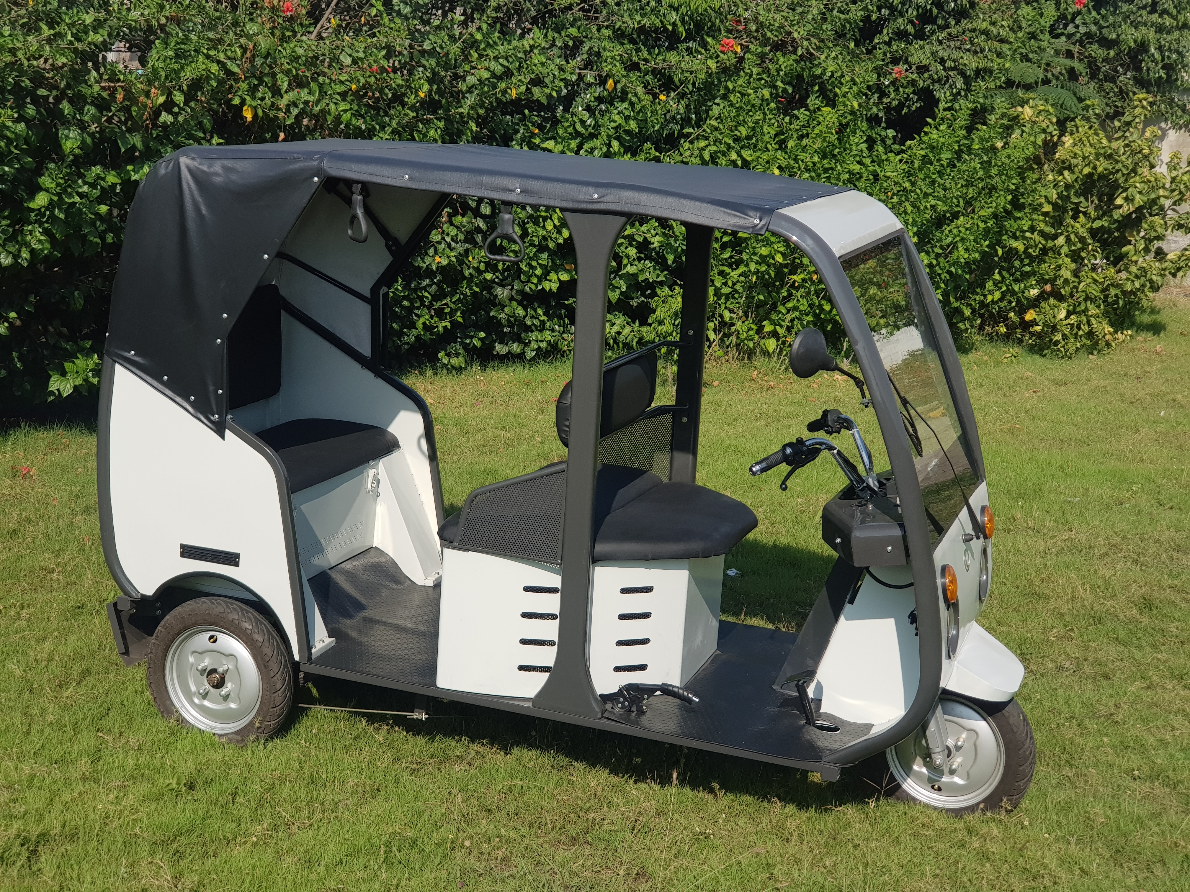 White Electric Rickshaw