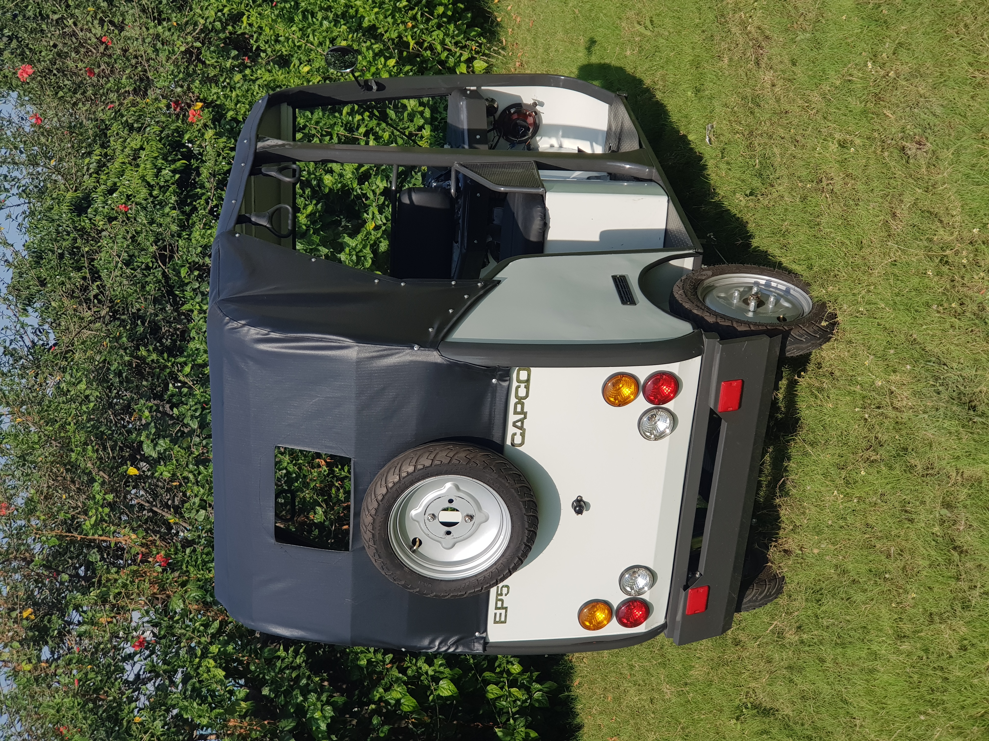 White Electric Rickshaw