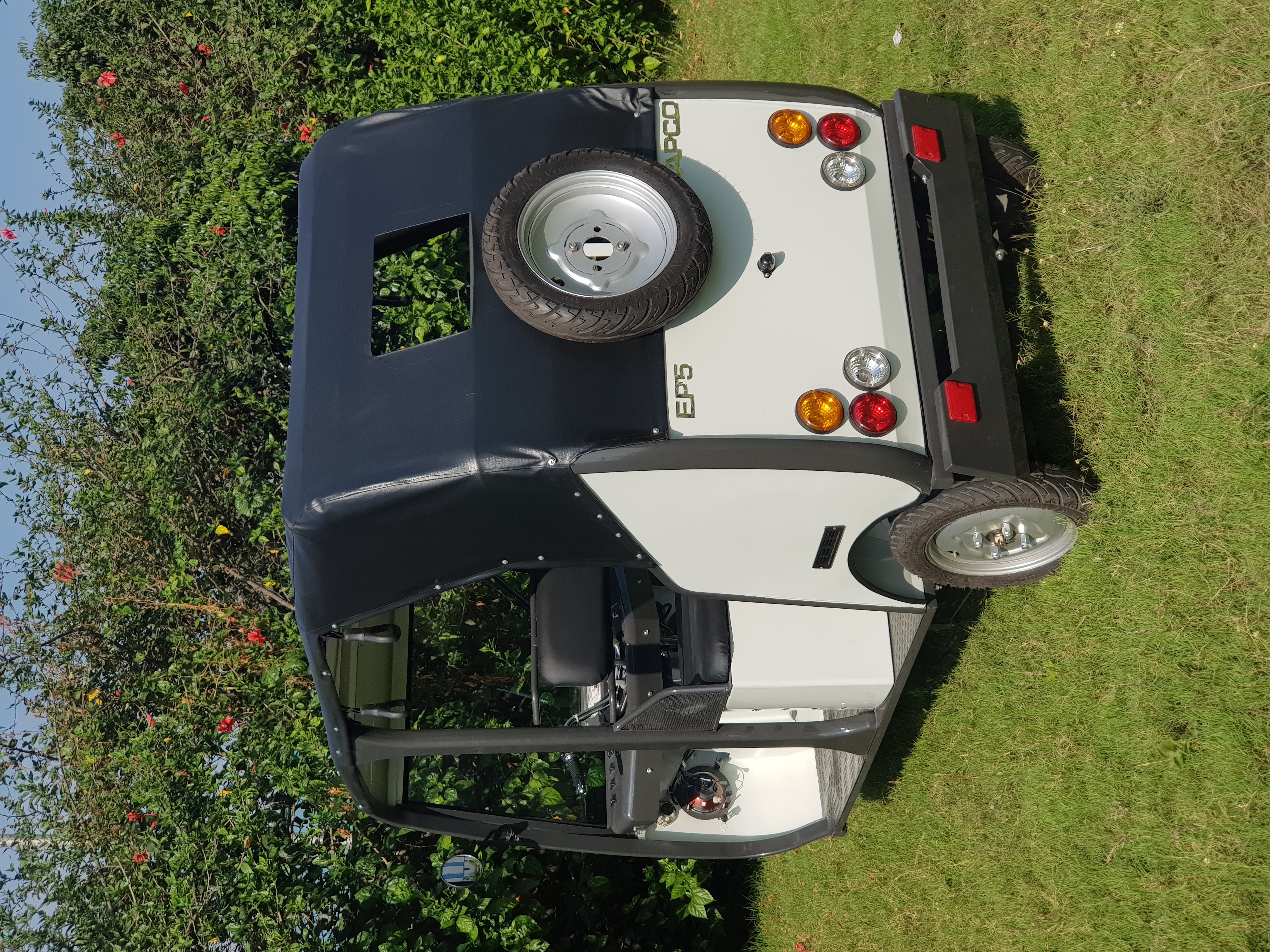White Electric Rickshaw