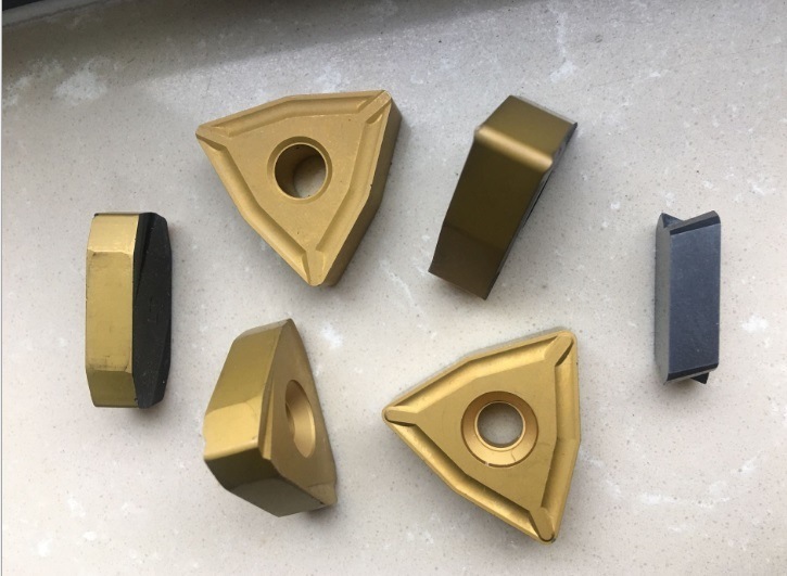 Black/yellow Tnmx1106-2 Cnc Peeling Turning Tool Inserts