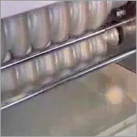 आटा गेंद बनाने की मशीन