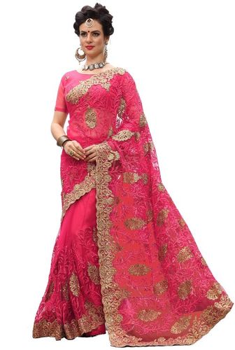 बेज नेट हैवी एम्ब्रायडरी स्टोन वर्क साड़ी