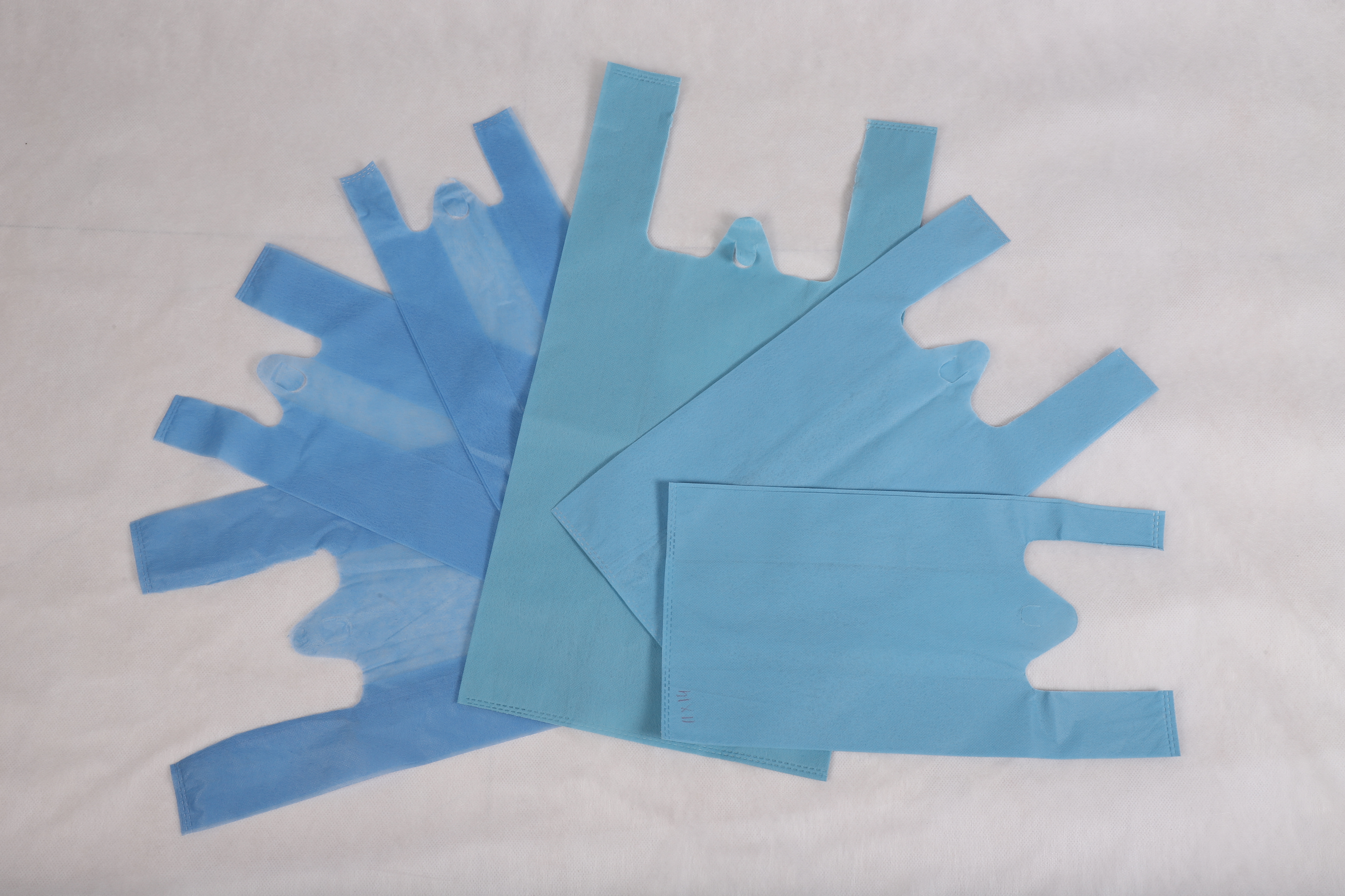 W Cut Bag - Non Woven Material, Various Dimensions, Blue Color | Moisture Resistant, Self-sealing, Tamper Proof, Waterproof, Excellent Security For Deliveries