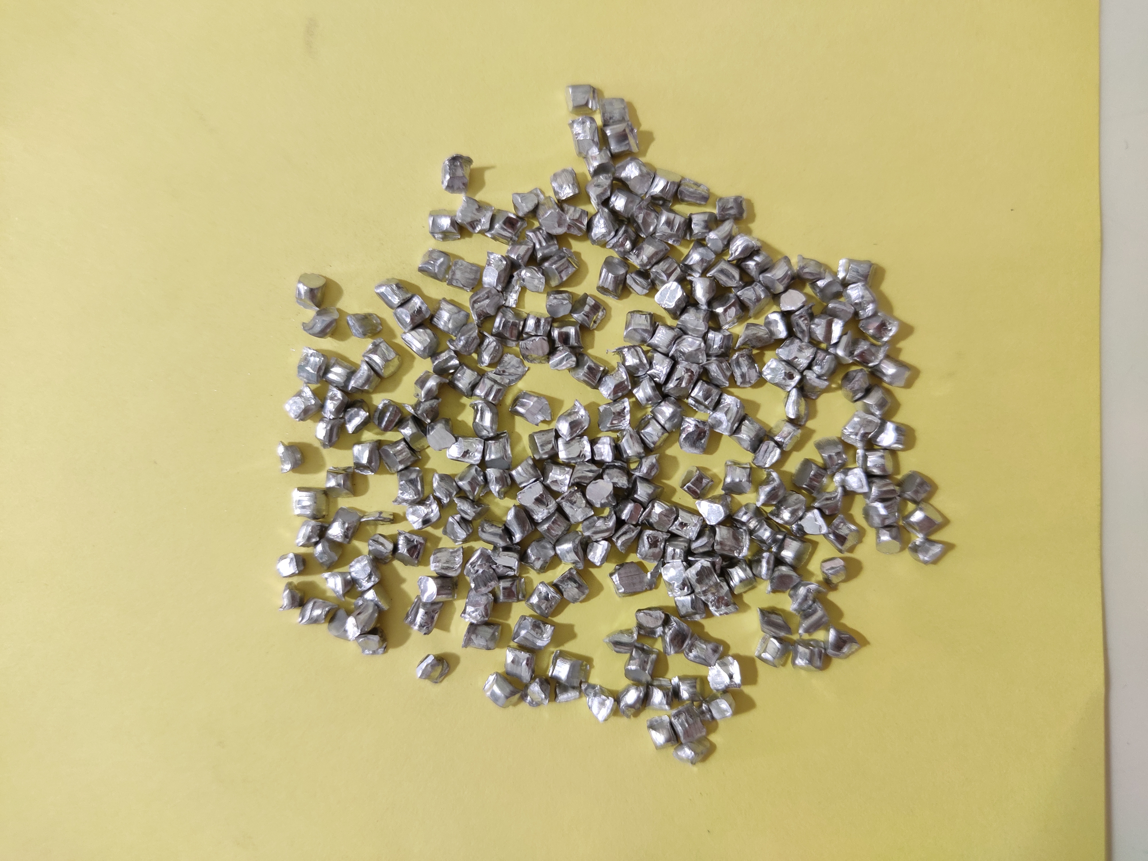 Zinc Cut Wire Shots - 99.99% Zinc, Sizes 0.6 Mm To 2.5 Mm, Silver Grey Color | Angular Grain Shape, Ideal For Aluminium Die Casting & Cleaning