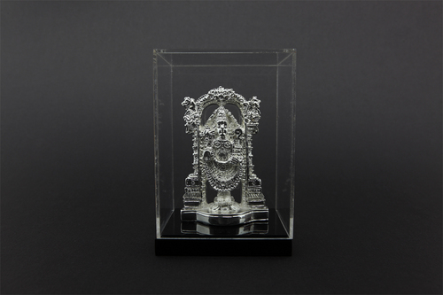 फ्रेम बॉक्स में चांदी की मूर्ति
