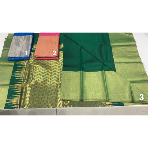 महिलाओं की प्योर कांजीवरम कटान वर्क साड़ी में उपलब्ध