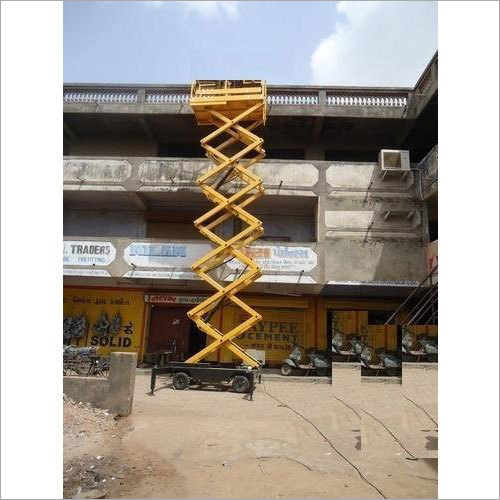 Industrial Scissor Lift Table - Mild Steel, 40 Long Ton Capacity, Yellow Color | Hydraulic Power Source, Height Adjustable, Safe Gaps for User Safety
