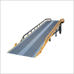 Industrial Dock Ramp - Durable Iron Metal, 6000 kg Capacity , Safety Features for Reliable Loading & Unloading