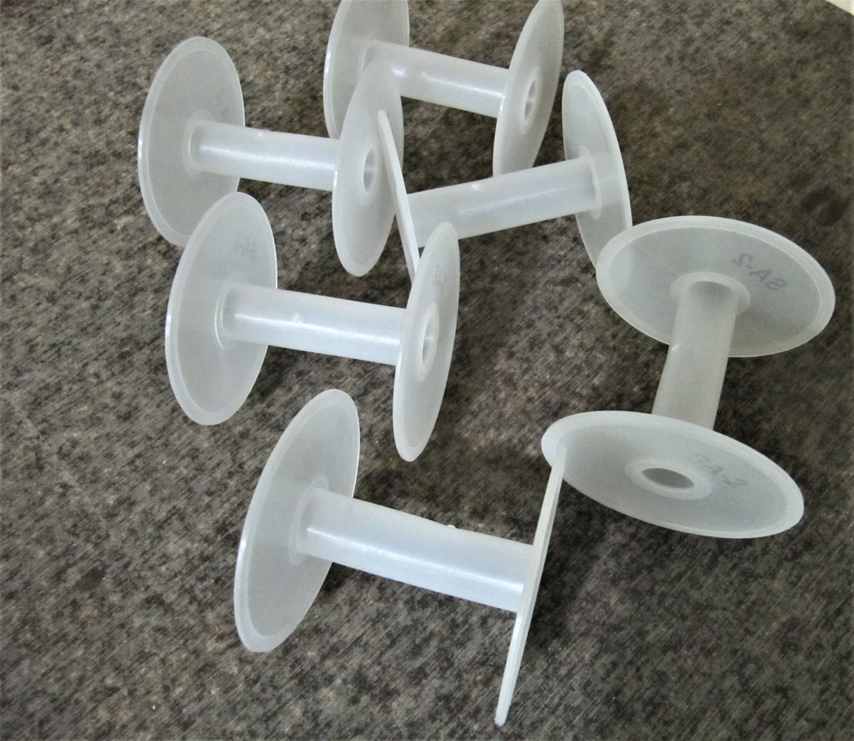 White Plastic Wire Spools - 2.5 Inch Cylindrical Design | First Quality Plastic Granules, Customizable Colors And Sizes