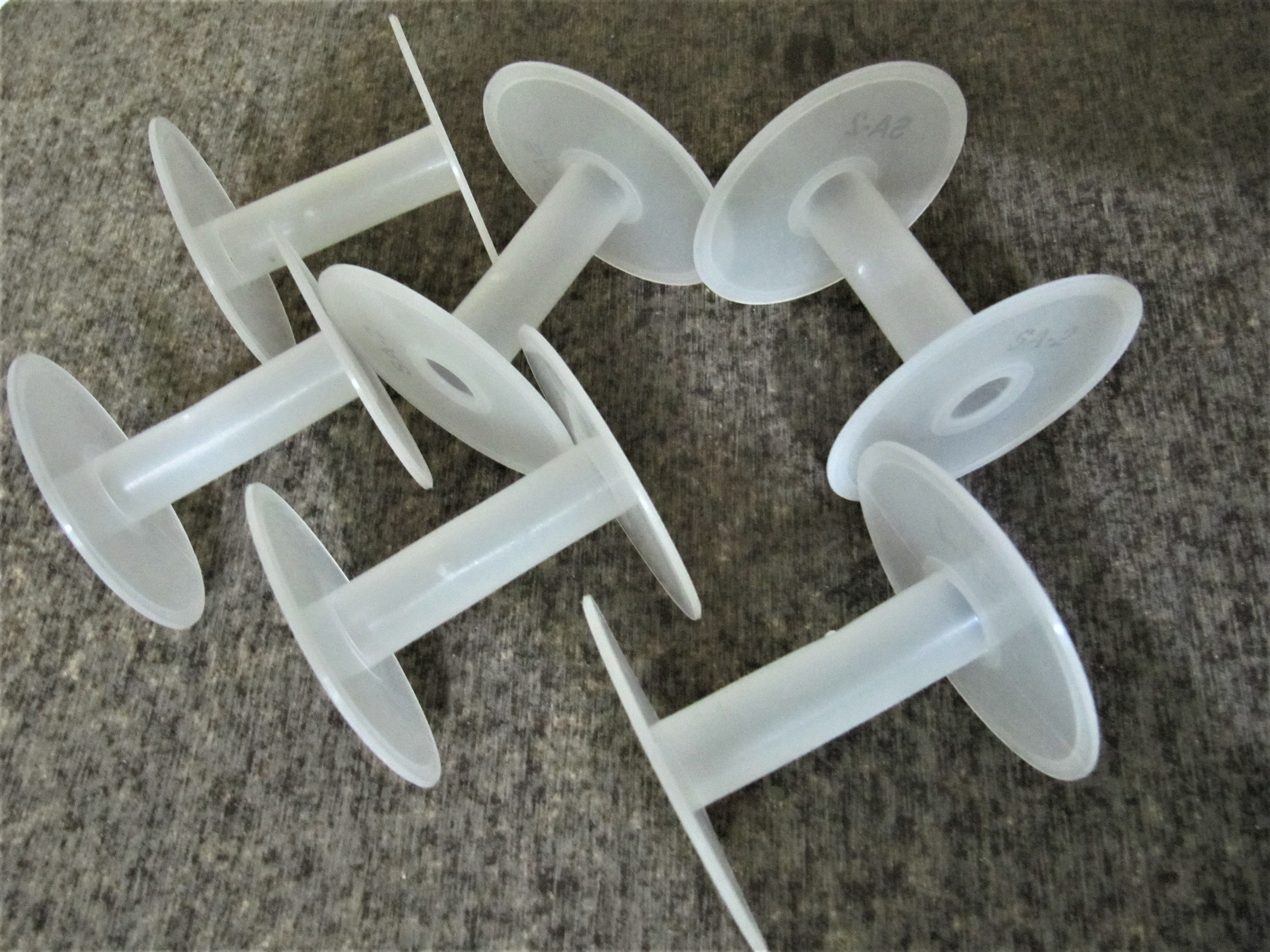 White Plastic Wire Spools - 2.5 Inch Cylindrical Design | First Quality Plastic Granules, Customizable Colors And Sizes