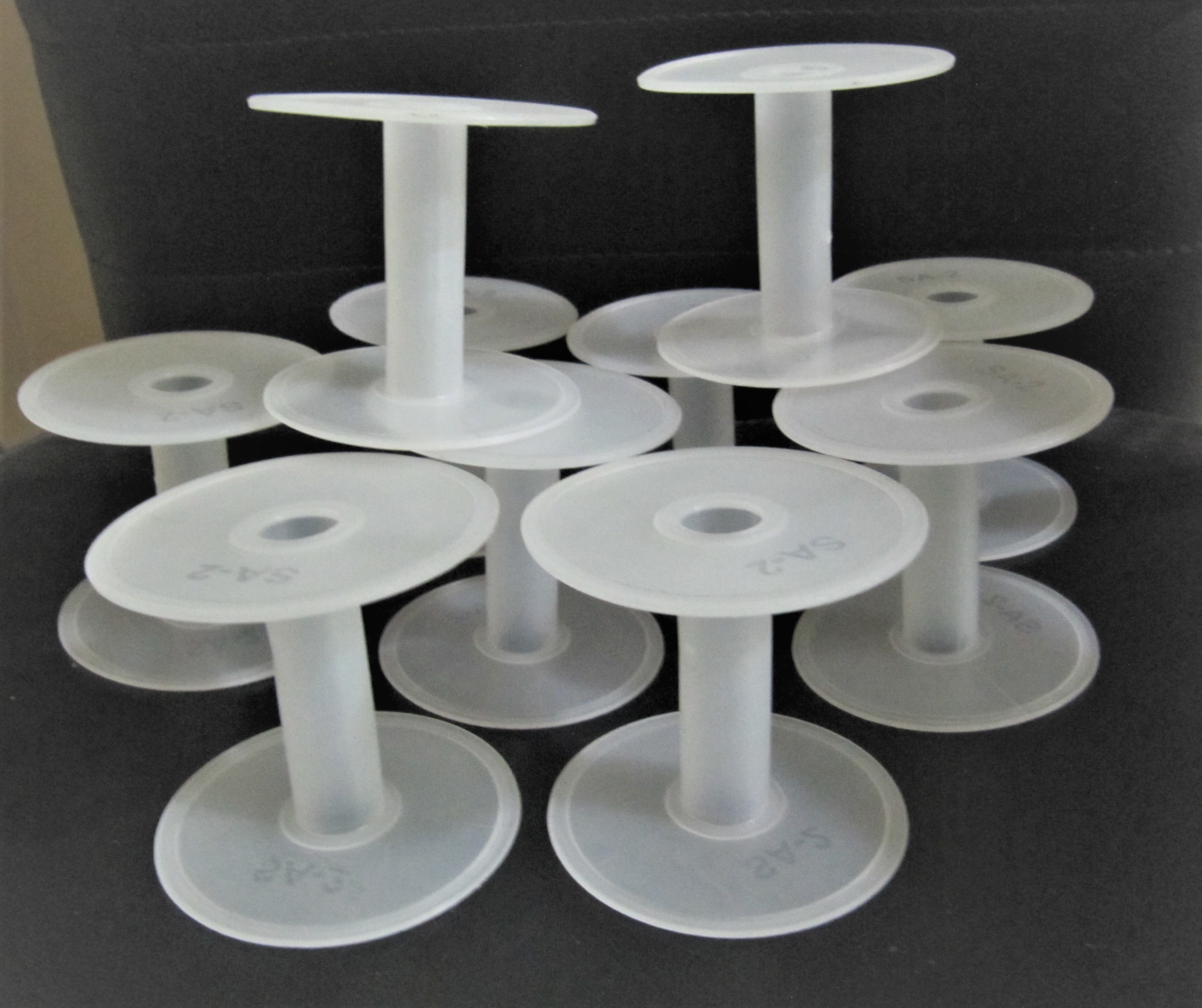 White Plastic Wire Spools - 2.5 Inch Cylindrical Design | First Quality Plastic Granules, Customizable Colors And Sizes