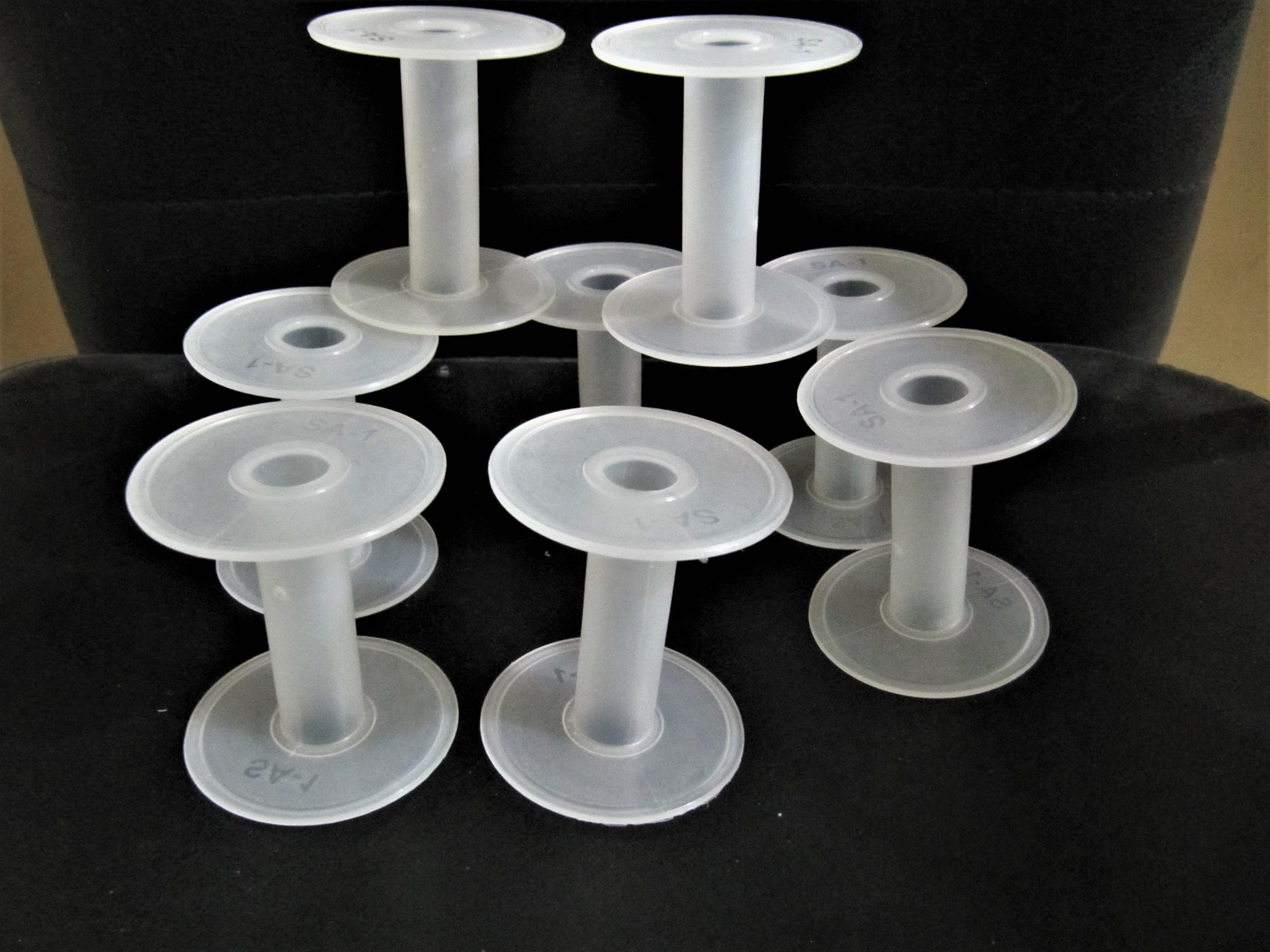 White Plastic Spools - 2.5 Inch Cylindrical Design | First Quality Plastic For Chains, Wires, Tapes, And Threads