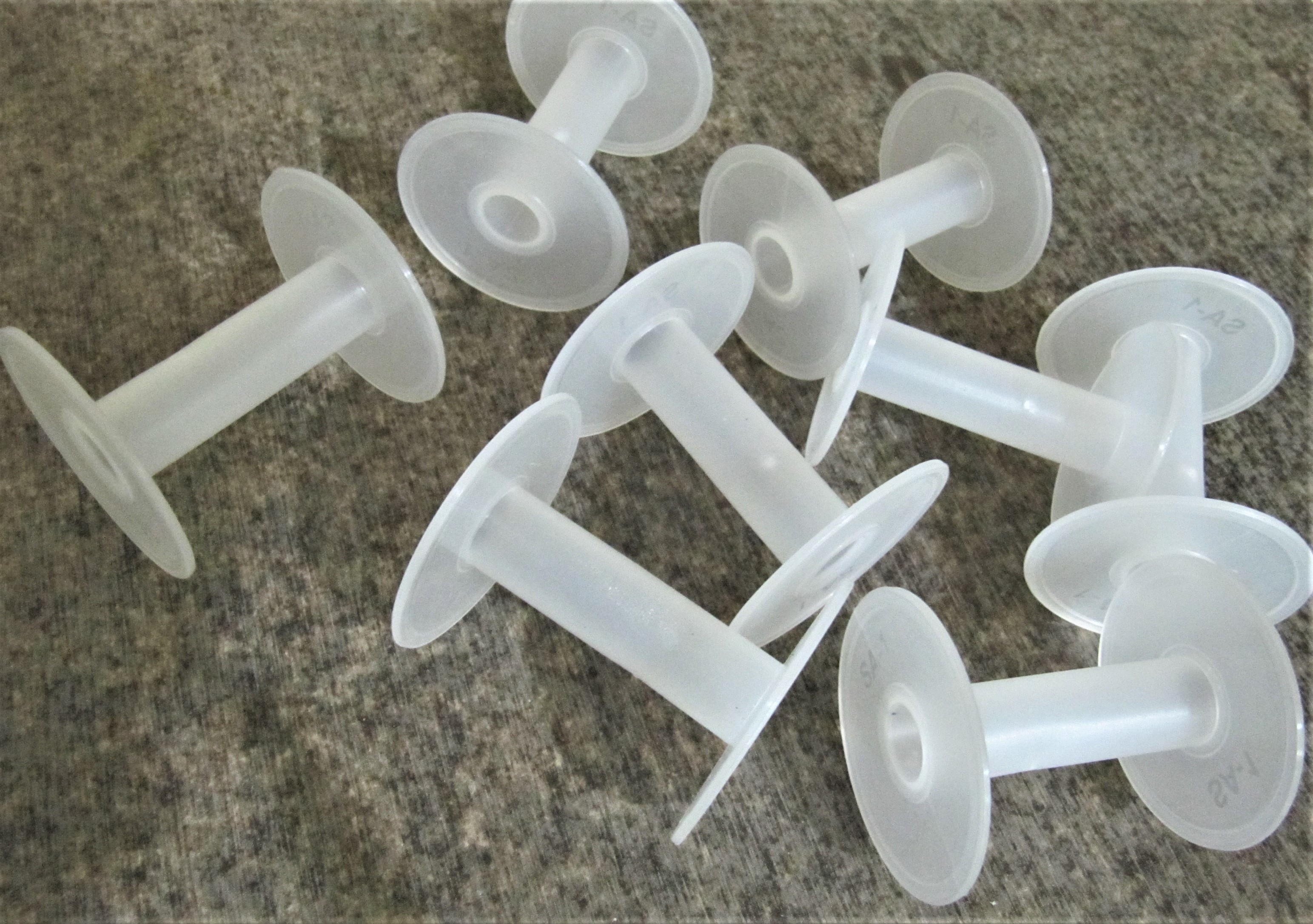 White Plastic Spools - 2.5 Inch Cylindrical Design | First Quality Plastic For Chains, Wires, Tapes, And Threads