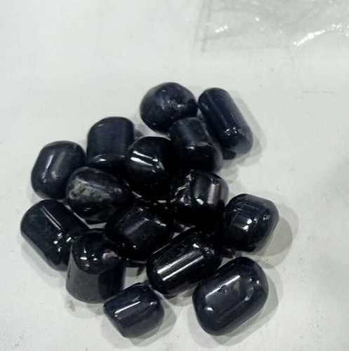 काला टूमलाइन टंबल्ड स्टोन