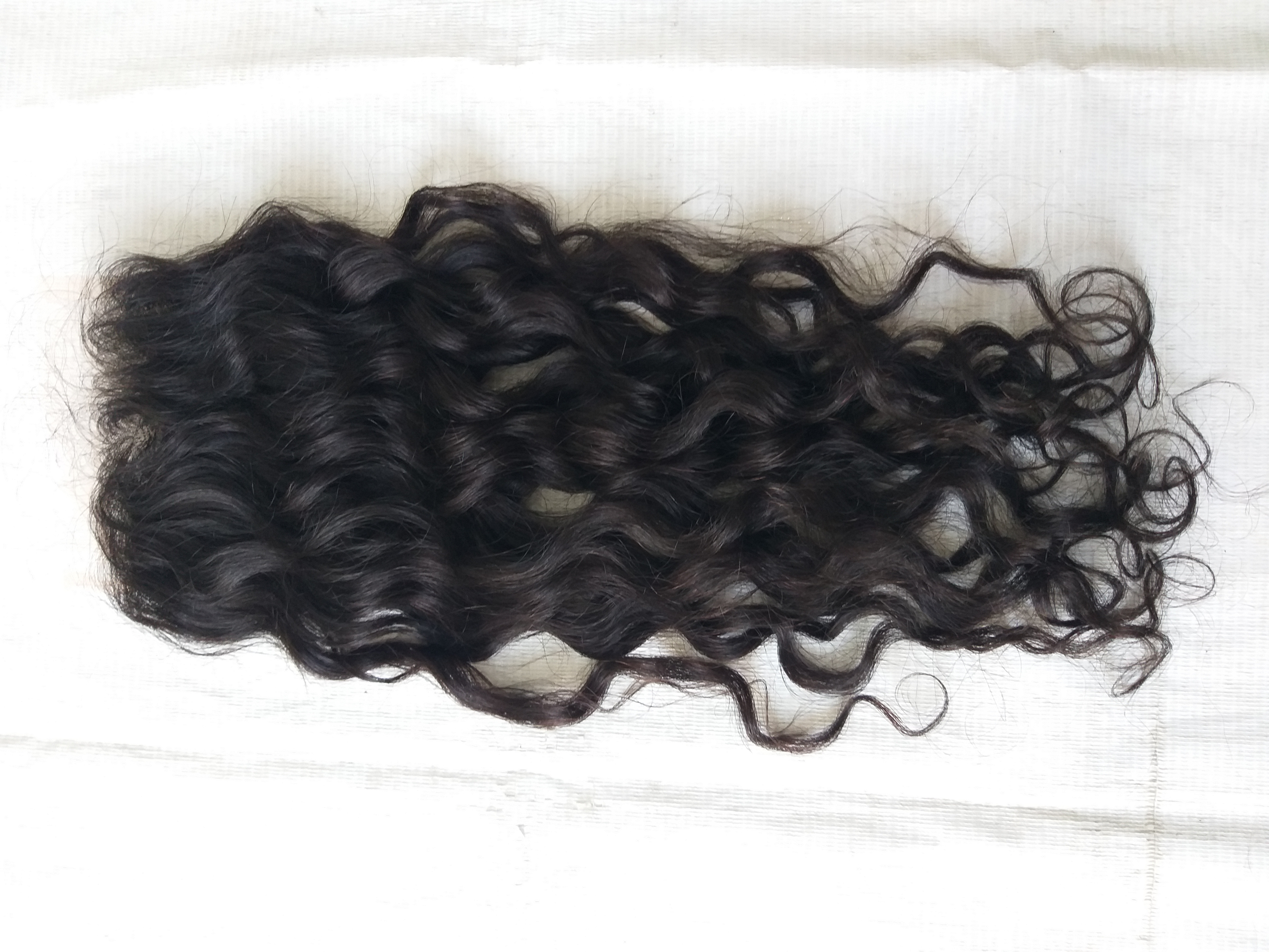 Unprocessed Wavy Transparent 4x4 Lace Closure - Color: Natural Color Available