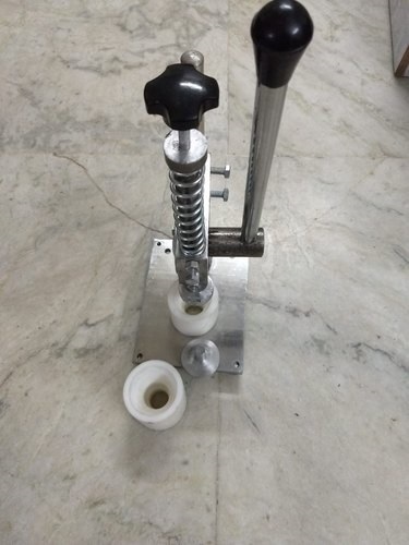 Silver & White Tikki Fitting Machine