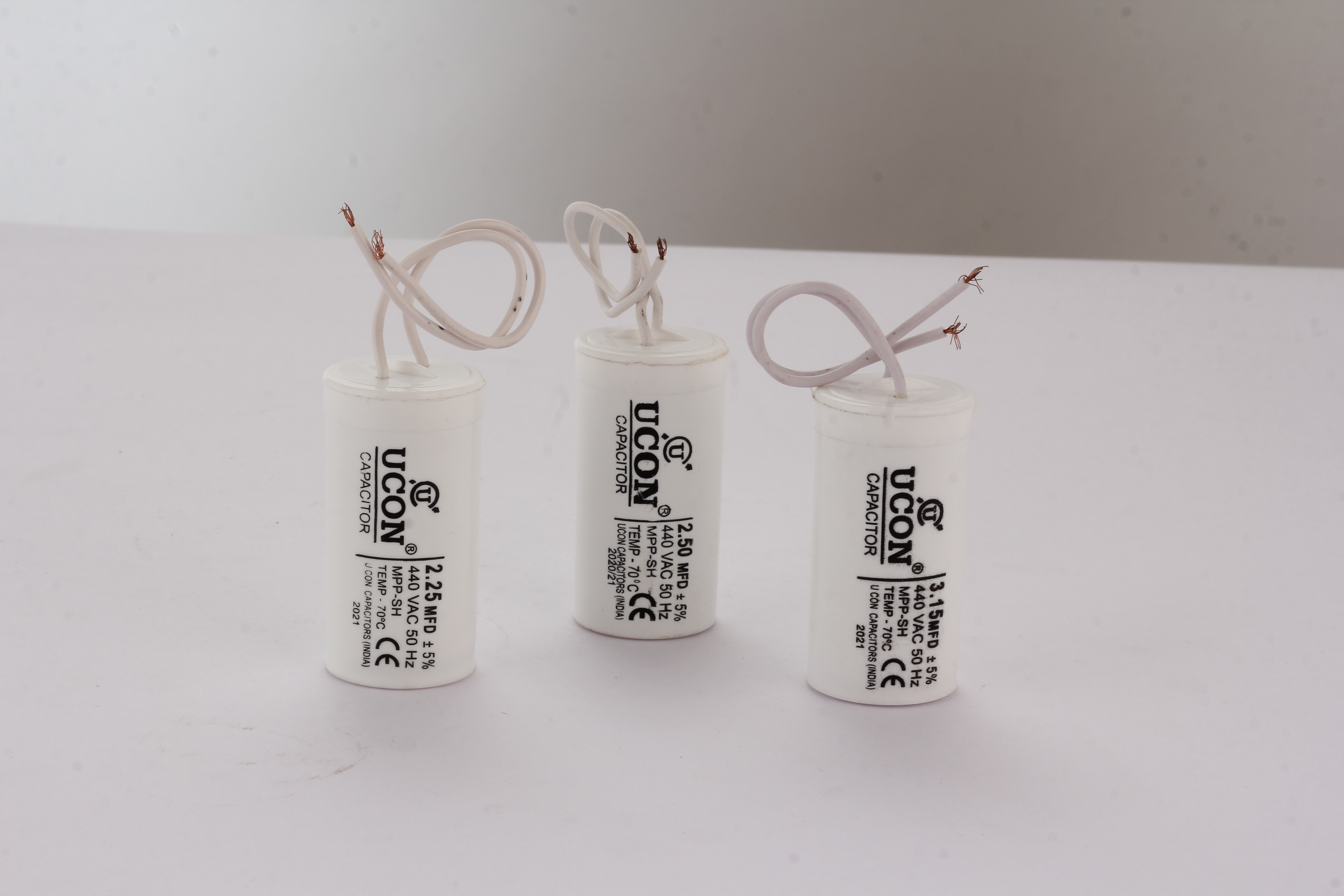 Fan Capacitor - 27*52 Mm, Round Cylinder Shape, White Color | Ac Current, Rated Voltage 440v, Ideal For Ceiling Fans, 2-year Warranty