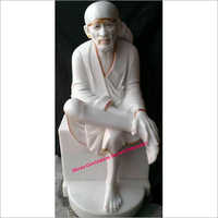 मार्बल साईं बाबा की प्रतिमा पर नक्काशी