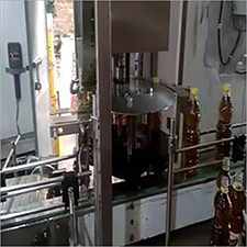Filling And Capping Machine For Mustard Oil Edible Oil Lubricant Oil Application: Beverage
