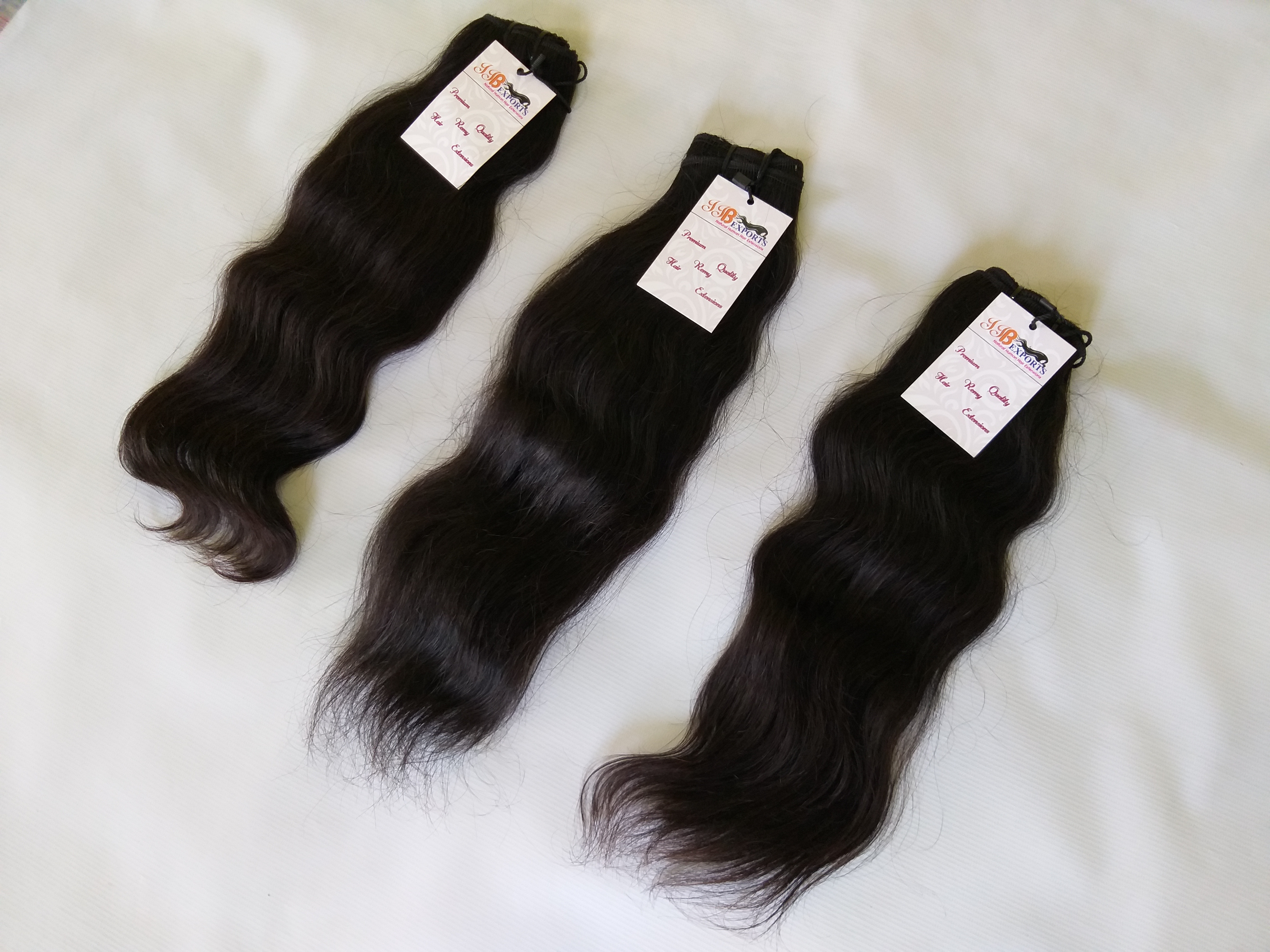 Natural Black Indian Best Virgin Unprocessed Mink Raw Hair Wavy Machine Made Double Wefted Bundles
