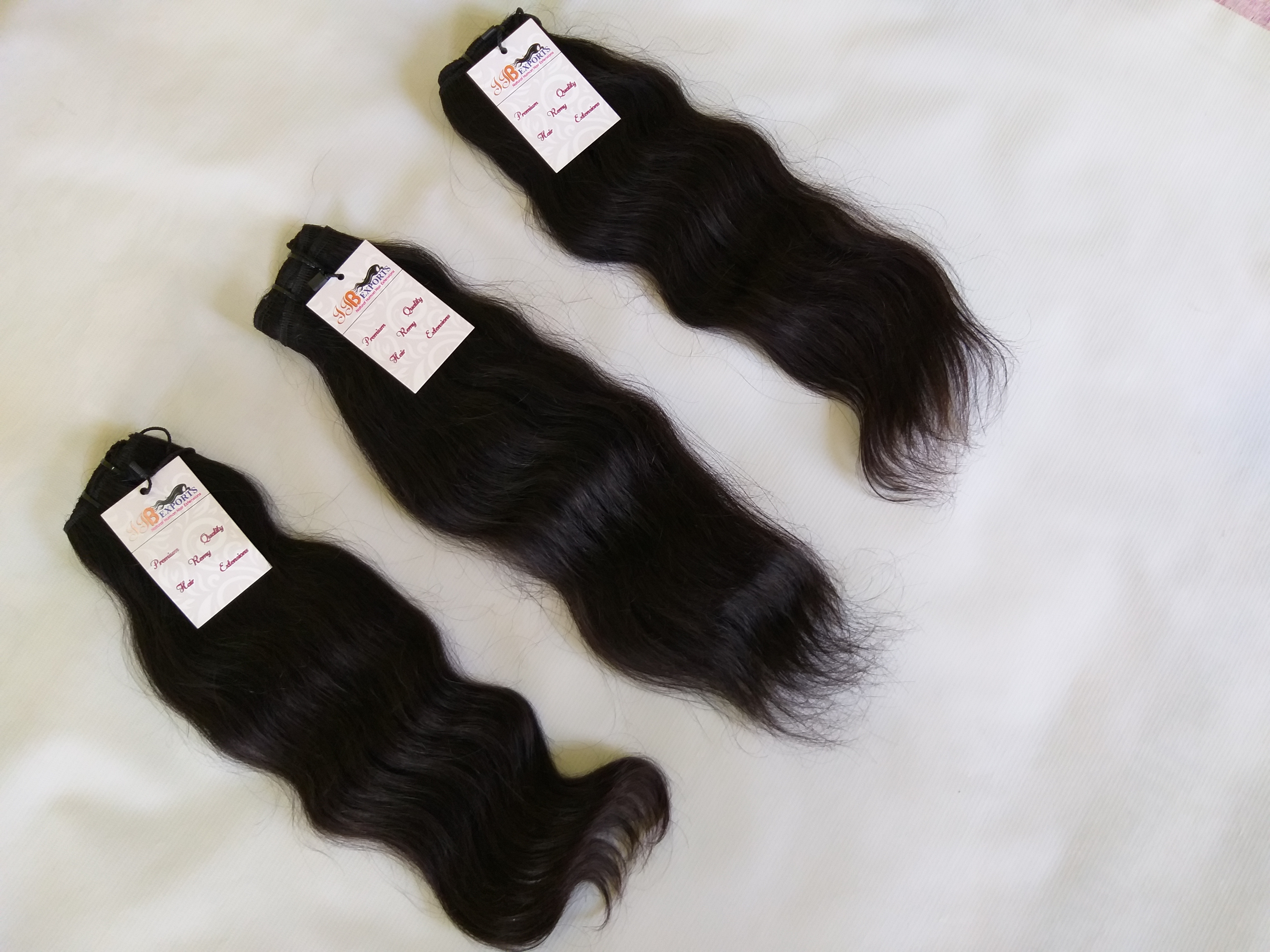 Natural Black Indian Best Virgin Unprocessed Mink Raw Hair Wavy Machine Made Double Wefted Bundles