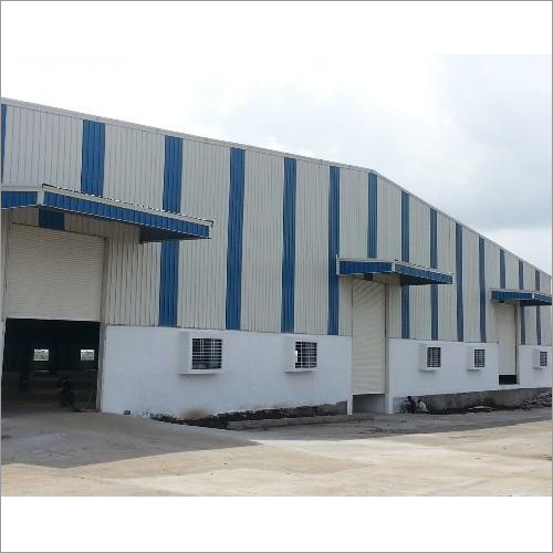 Prefabricated Industrial Buildings - Mild Steel Panel Build, 30 ft Height, Slope Roof, Galvanized Treatment, Eco Friendly, Easily Assembled, Blue Color