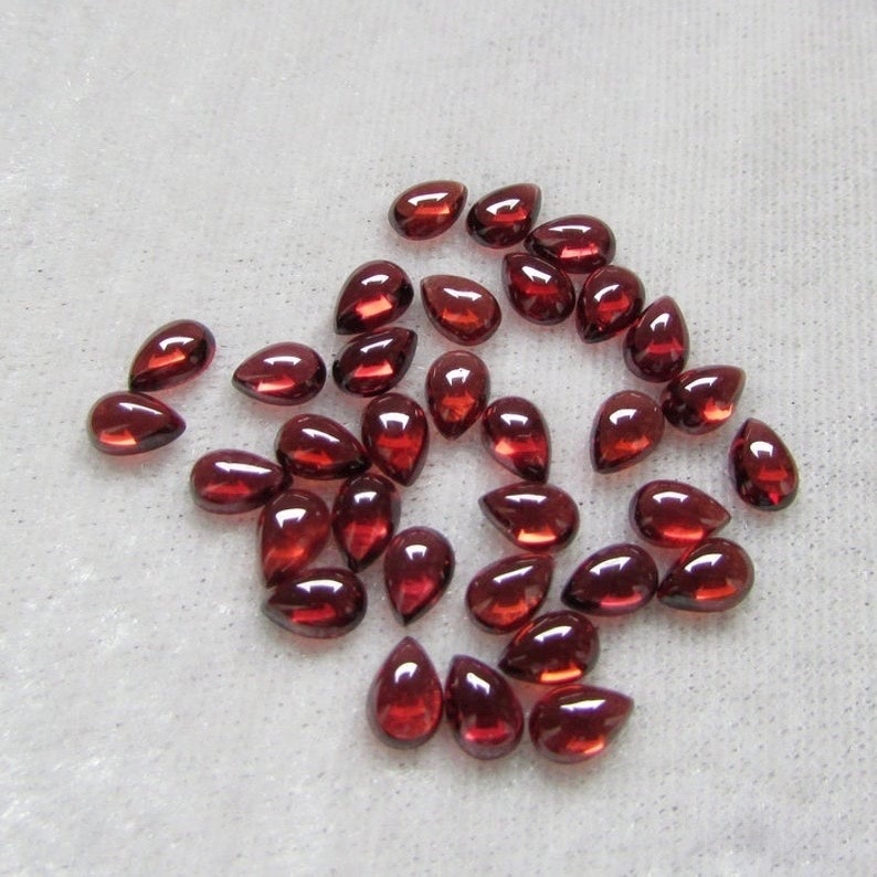 7x10mm Mozambique Red Garnet Pear Cabochon Loose Gemstones Grade: Aaa