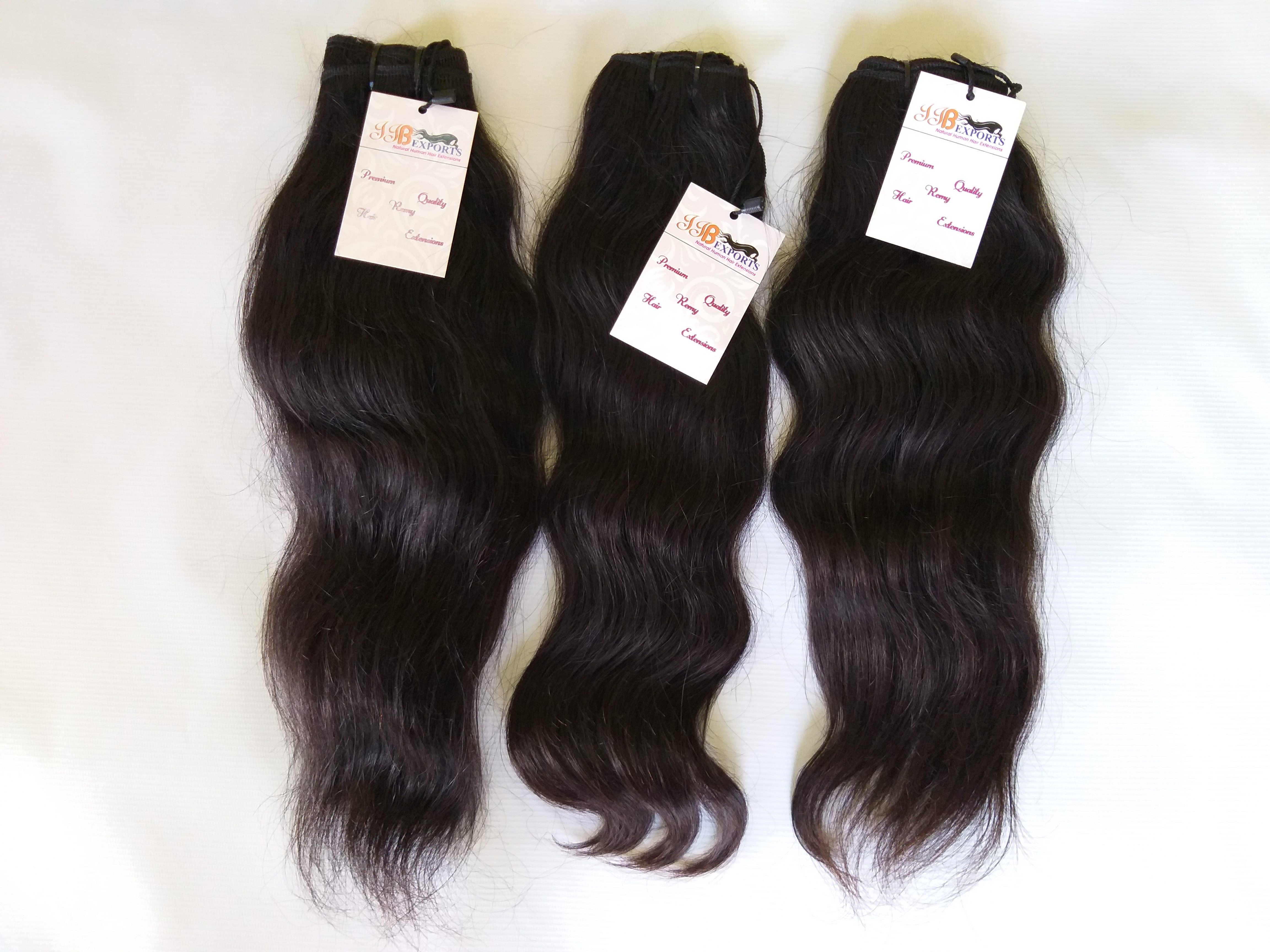 Indian Raw Unprocessed Top Quality Cuticle Aligned Wavy Human Virgin Hair - Color: Natural Black