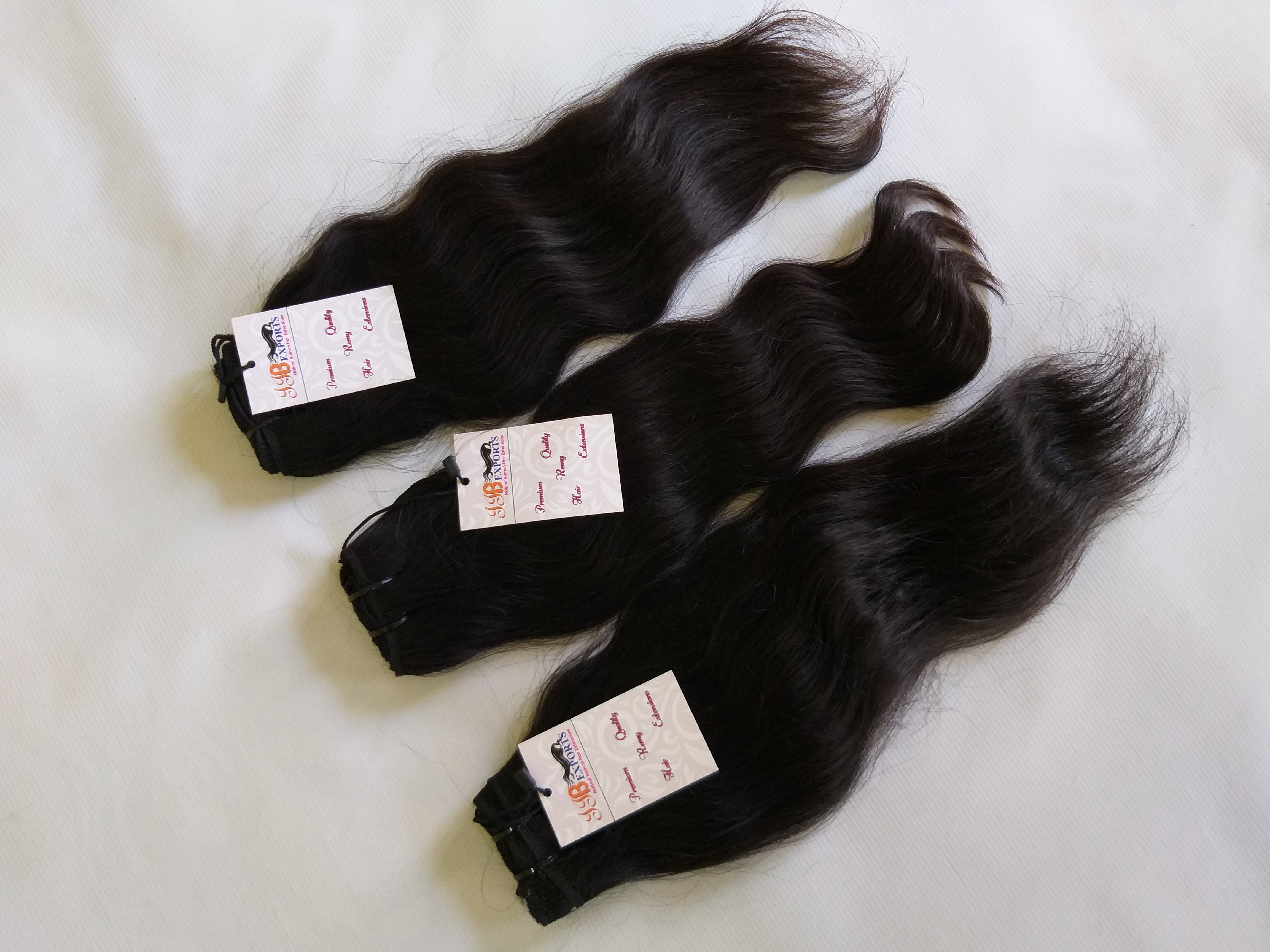 Indian Raw Unprocessed Top Quality Cuticle Aligned Wavy Human Virgin Hair - Color: Natural Black