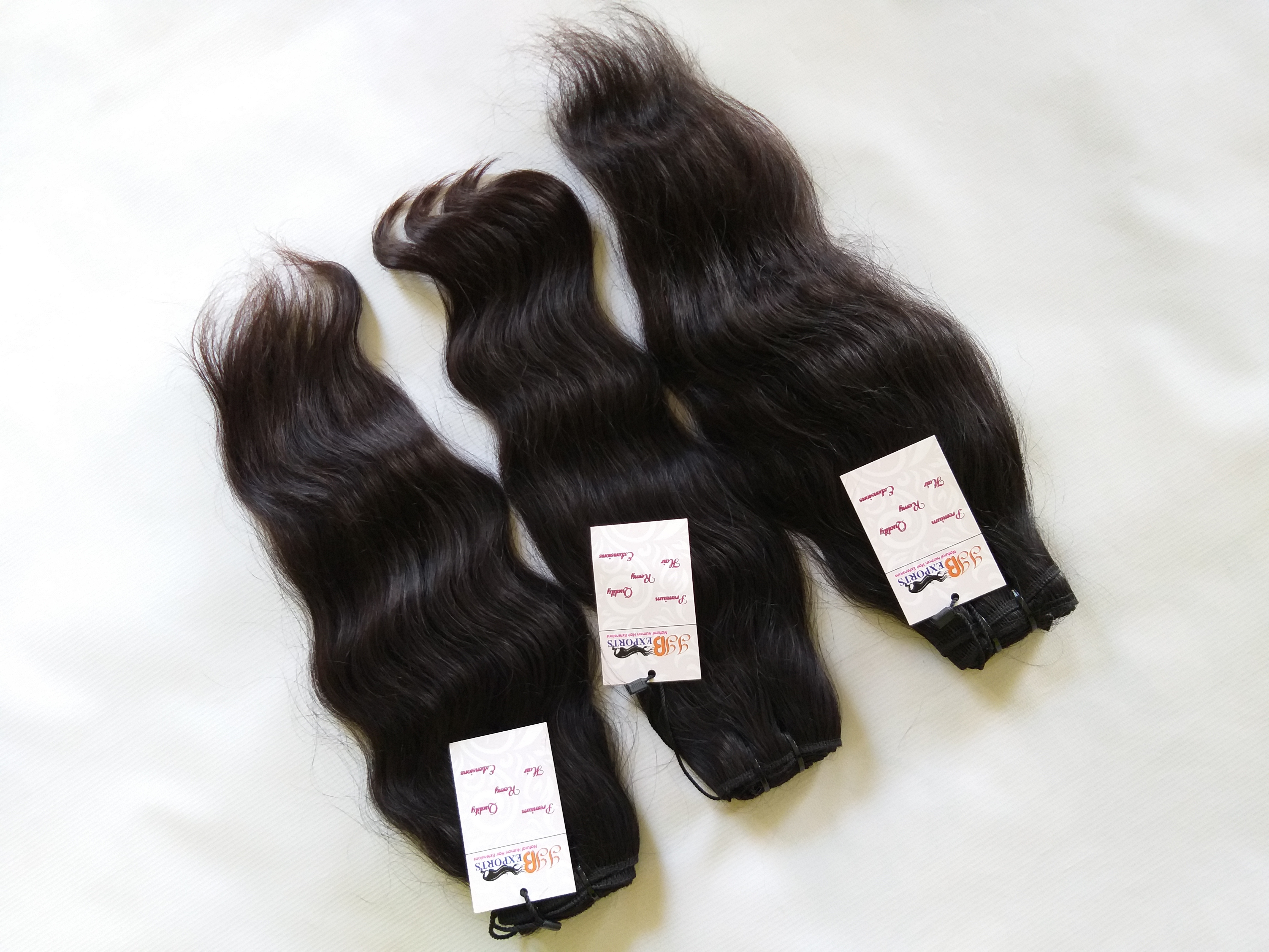 Indian Raw Unprocessed Cuticle Aligned Mink Tangle Free Natural Wavy Human Hair Bundle