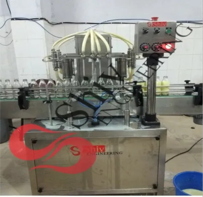 Fruit Juice Filling Machine - Metal, Automatic, High Efficiency | Low Maintenance, Rugged Design, Corrosion Resistant