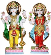 संगमरमर की विष्णु लक्ष्मी की प्रतिमा पर नक्काशी