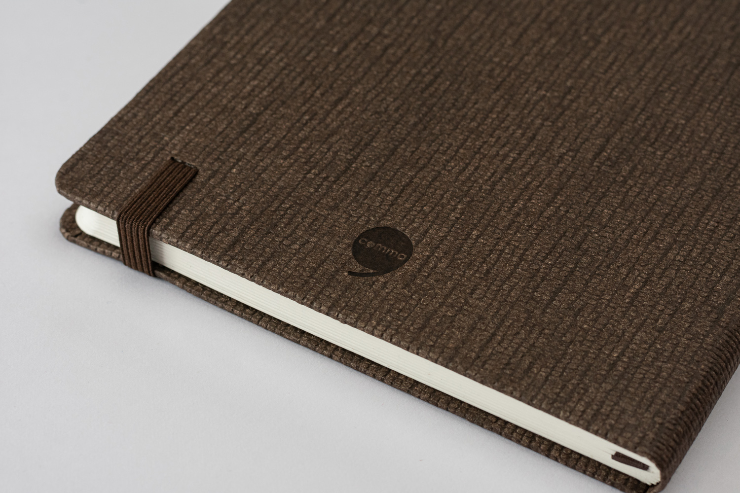 Features Include An Elastic Band Closure Comma Abaca - A5 Size - Hard Bound Notebook (Chocolate)